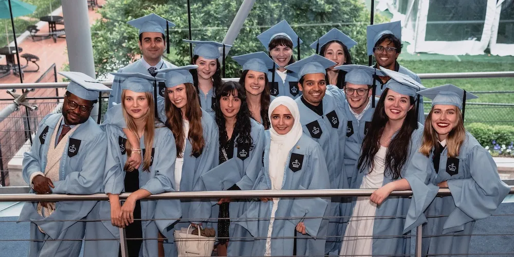 a group of students wearing graduation caps and gowns