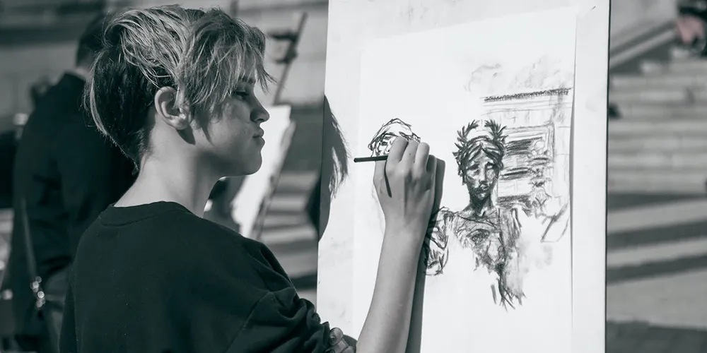 artist drawing statue