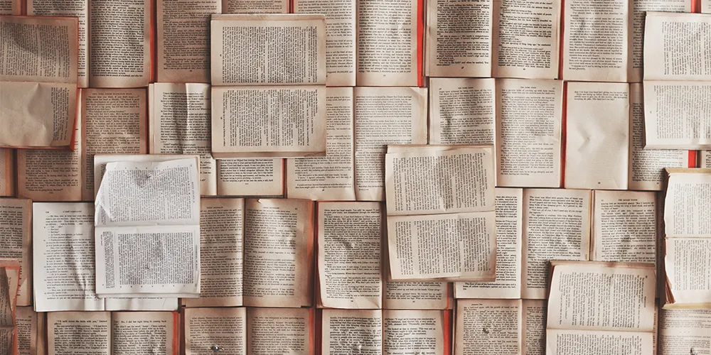 open books laid out on table