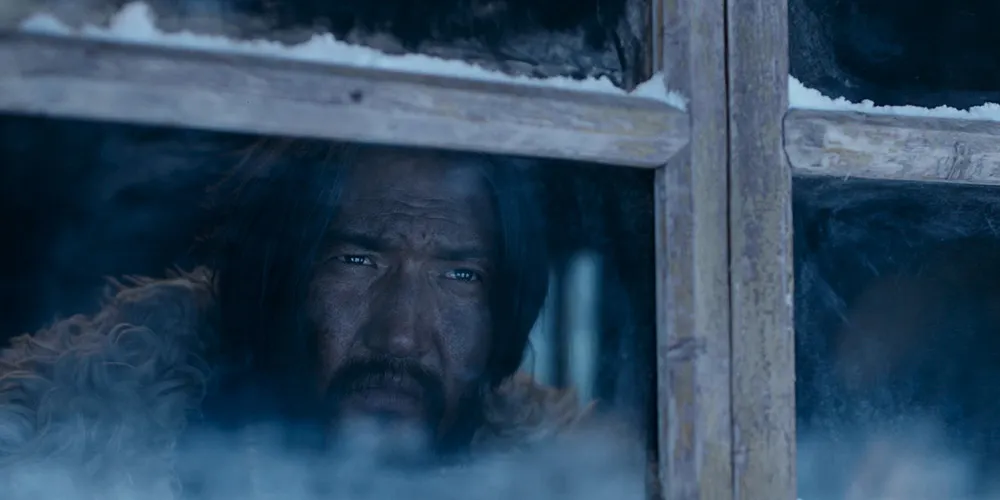 still from One and Four directed by Jigme Trinley of man looking through window