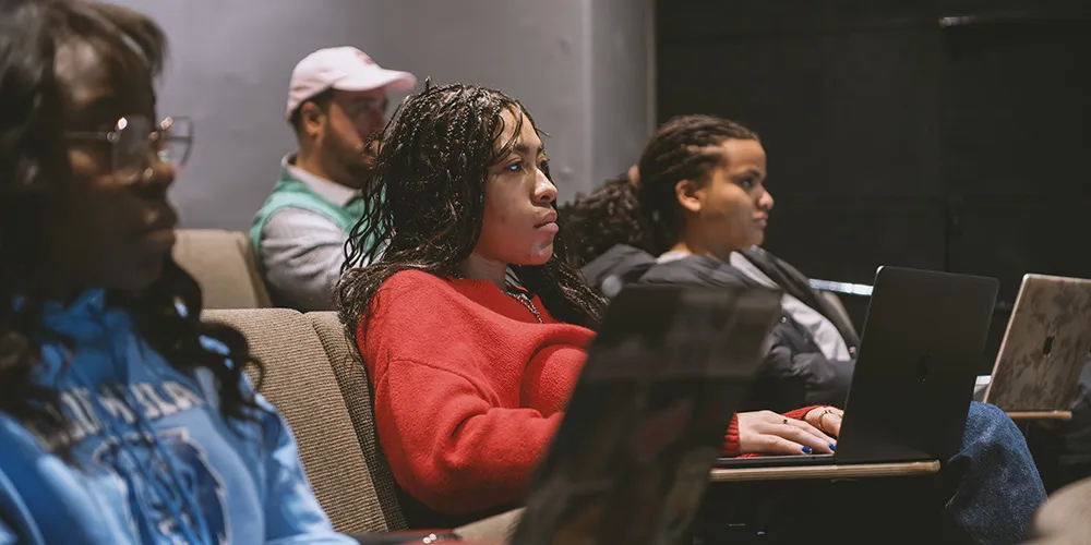 students take class in a lecture hall