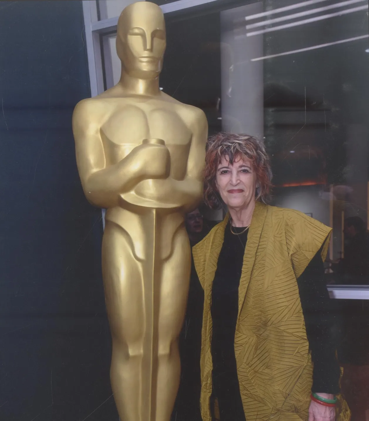 Jane Gaines with Oscar statue