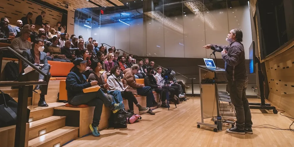 a professor teaches in a lecture hall