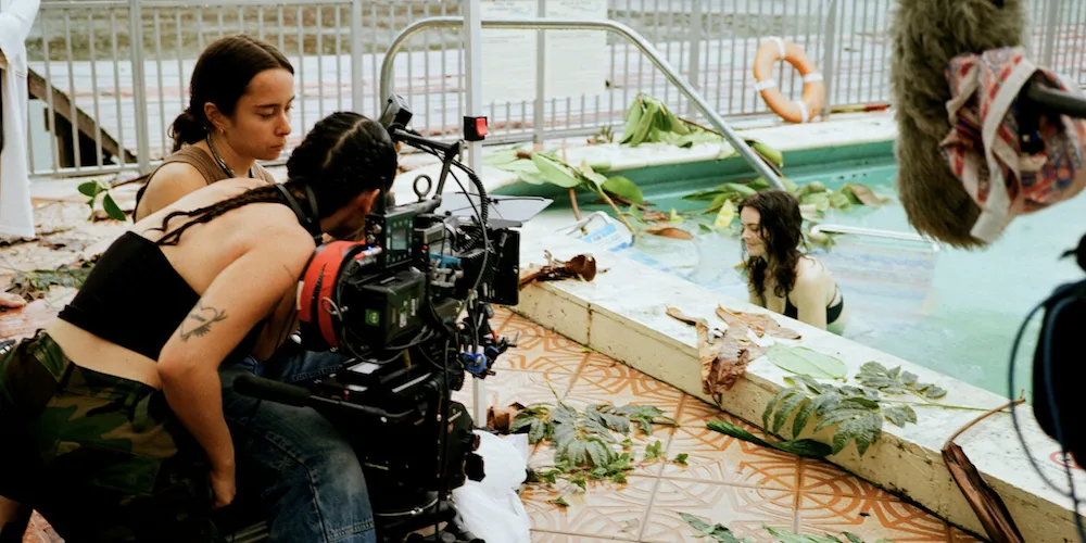 a director films a scene outside