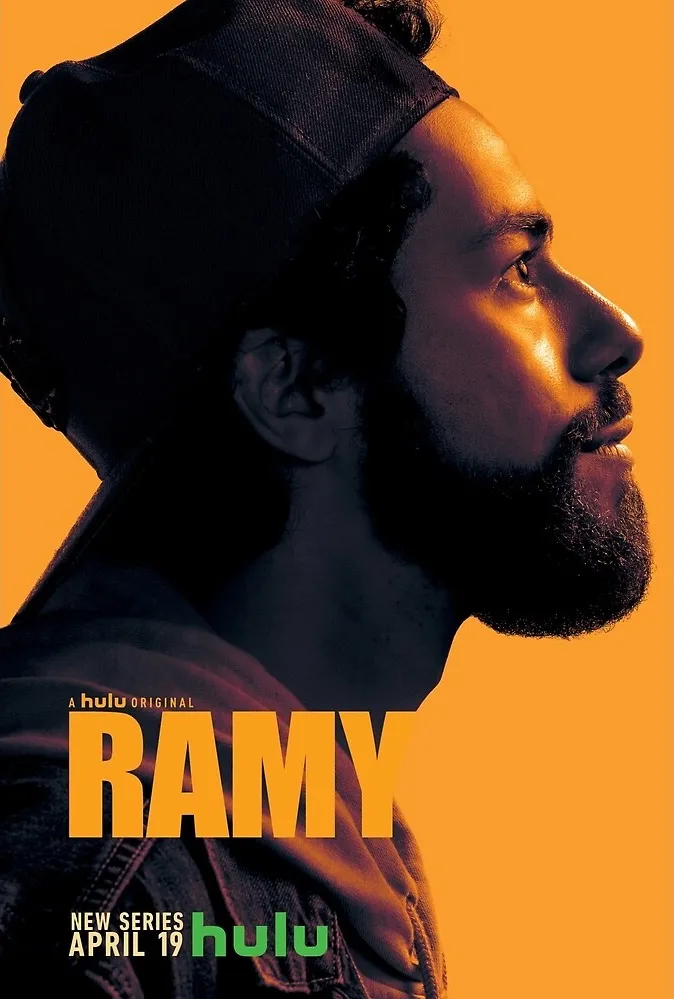 side profile of a man wearing a hat