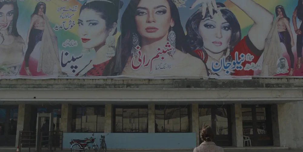 Woman gazing up at mural