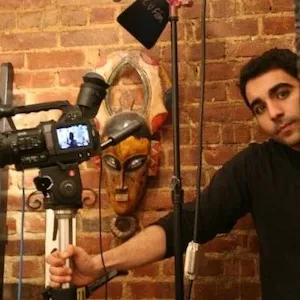 A man holds a camera