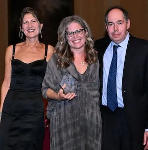 Dean Sarah Cole poses with celebrated Film alum Jennifer Lee '05 and Film Professor Andy Bienen '96 at the 60th Anniversary Gala. 