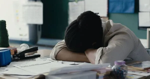 Person asleep at desk