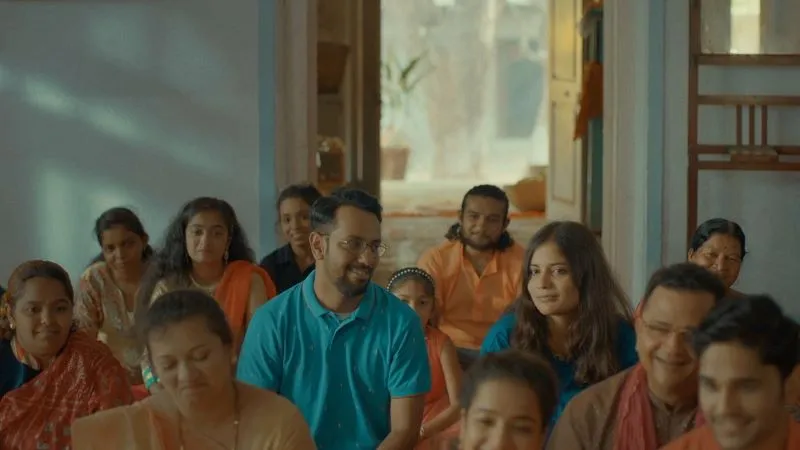 Room full of seated people