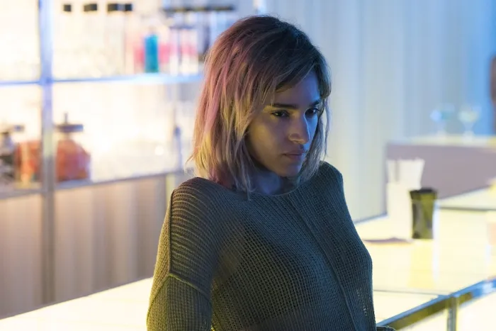 A woman at a bar.