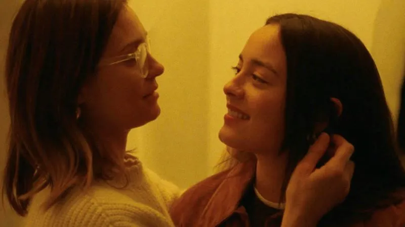 Two women looking closely at each other