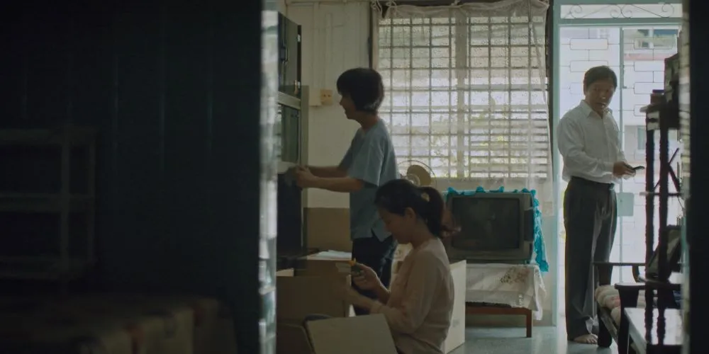Three people in an apartment