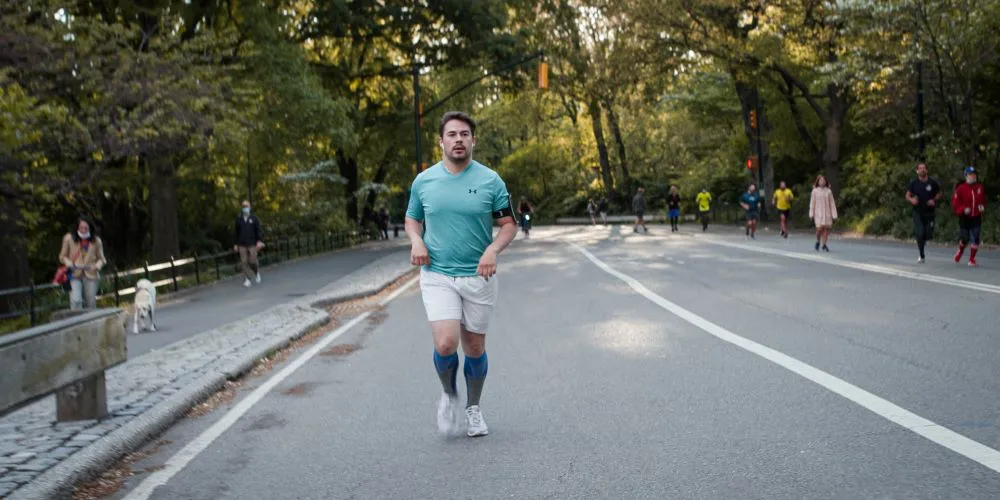 Man running through a park