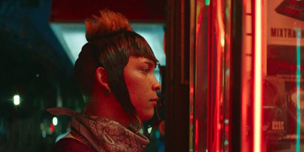 Character looking into neon-lit window