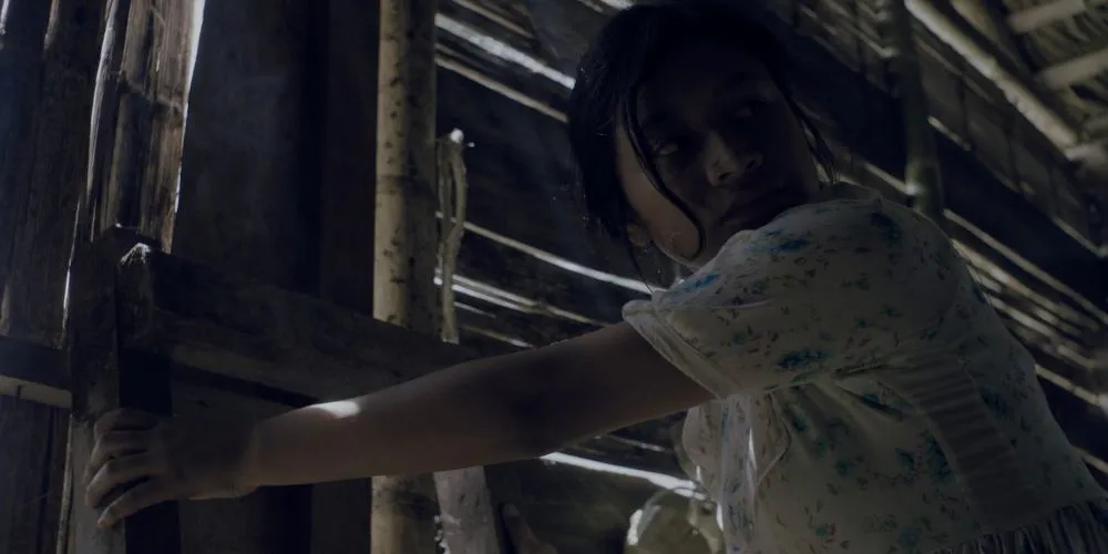 Woman in a wood building