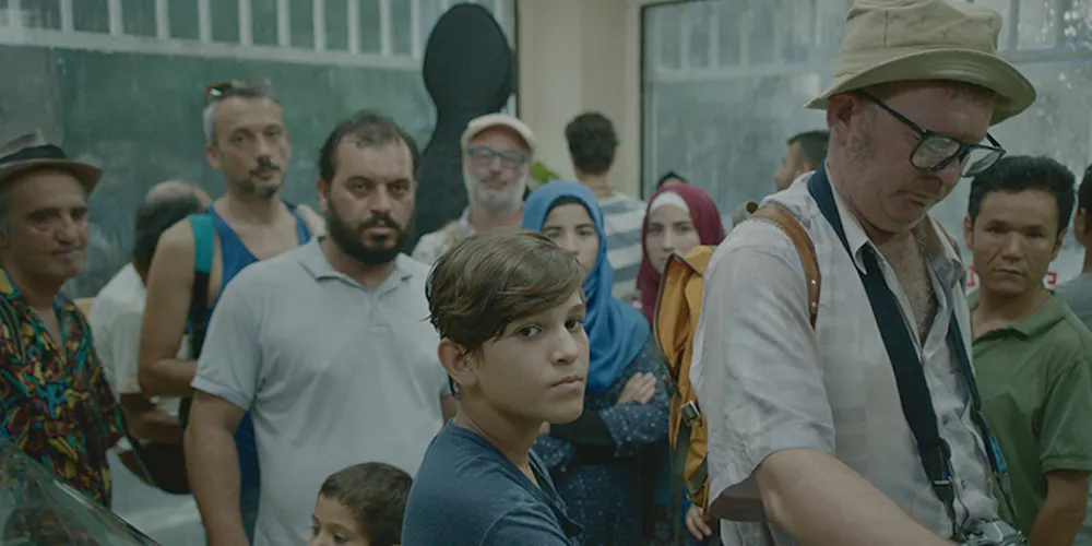 A group of people waiting indoors