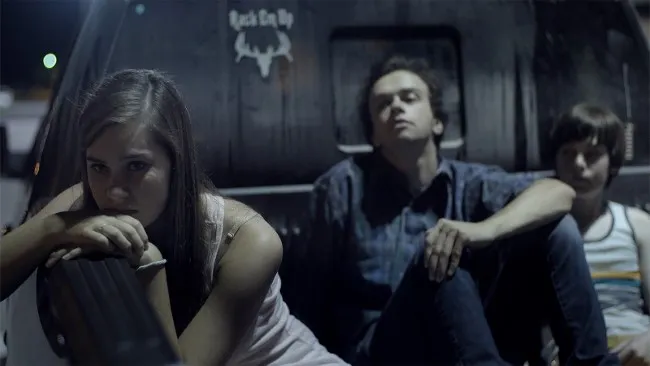 Girl in the back of a truck