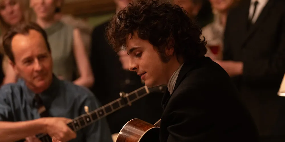 a man plays a guitar