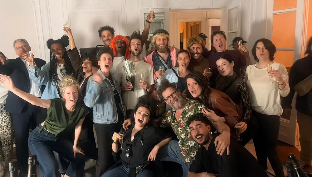 a group of people pose for a photo