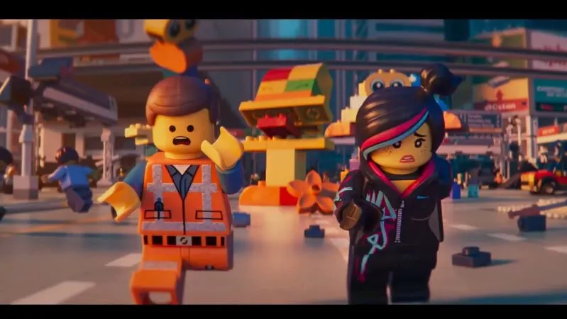 two Lego-toy characters running through city street