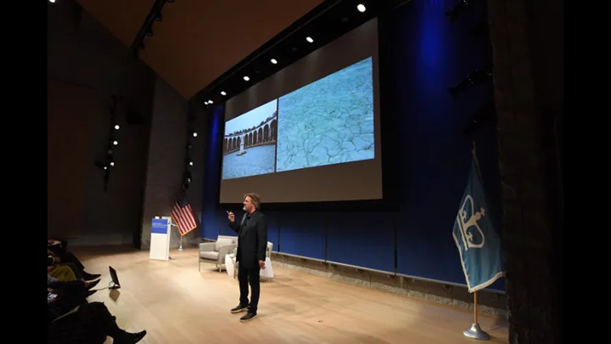 A speaker giving a presentation.