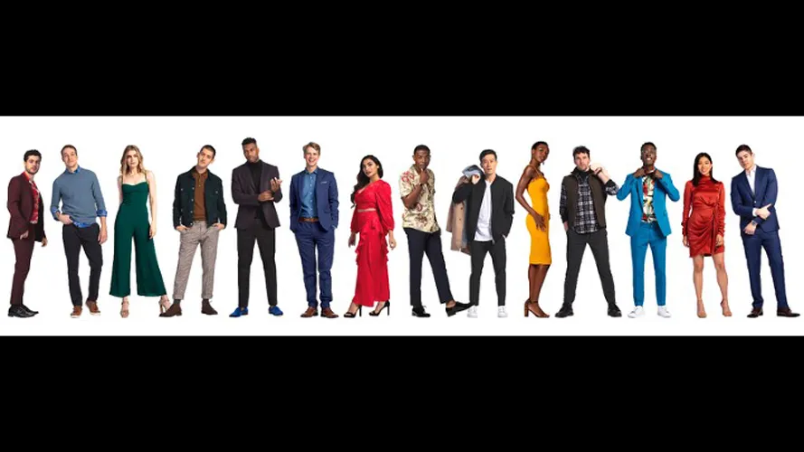 Group of students posing for a picture in formal attire.
