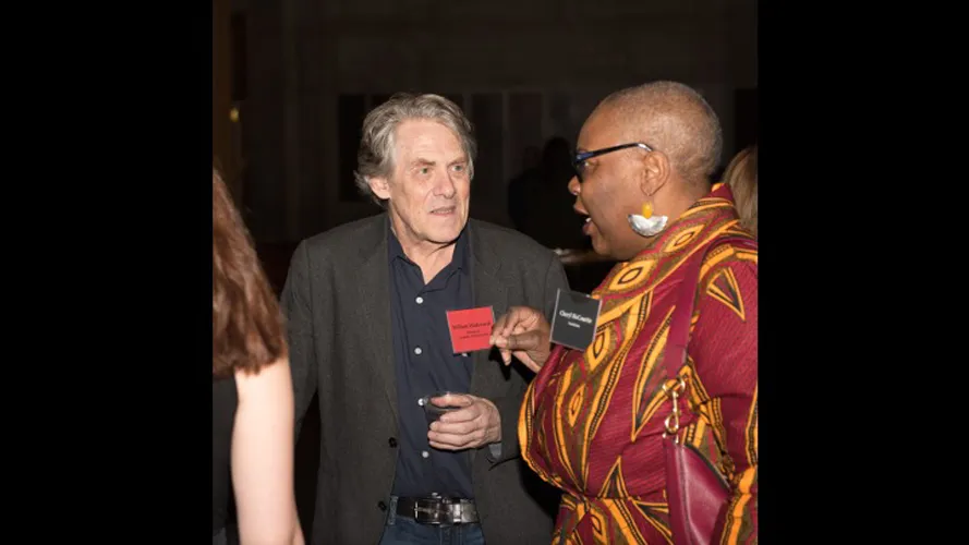 Man and a woman talking.