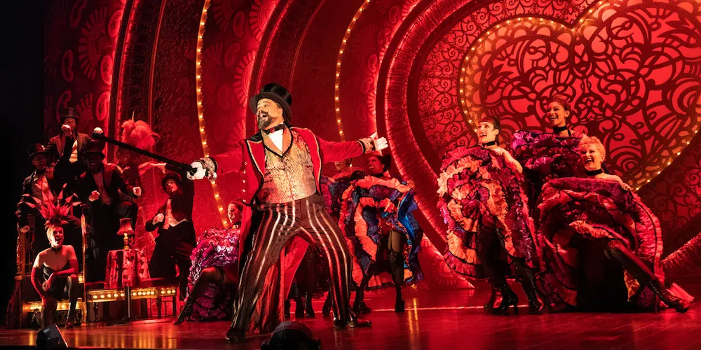 a group of actors perform on stage