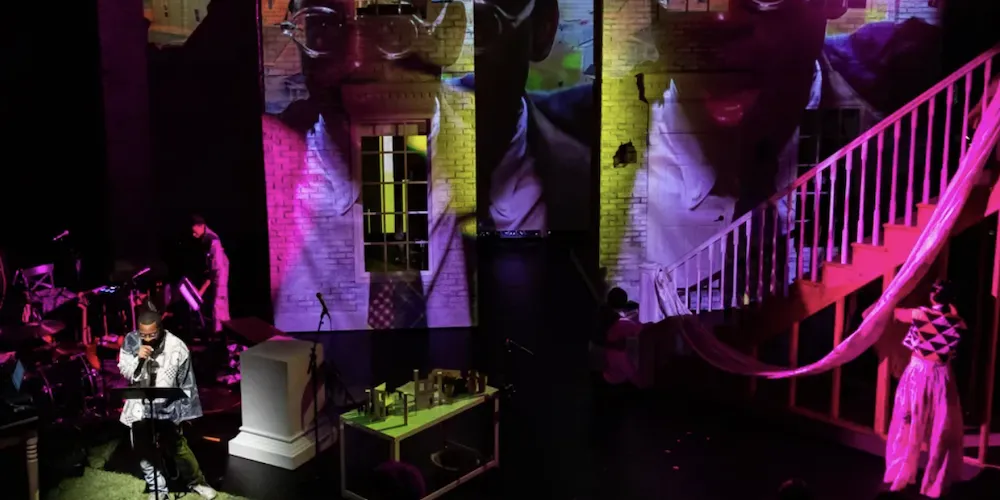 A stage colorfully lit with lights. 