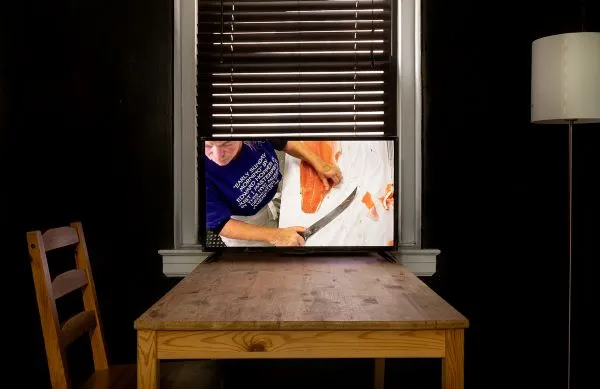 table with chair in front of window