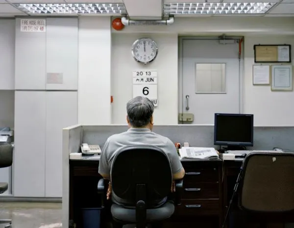 man at a desk in an office space