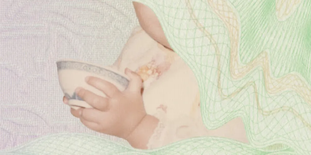 Baby covered in graph drawings.