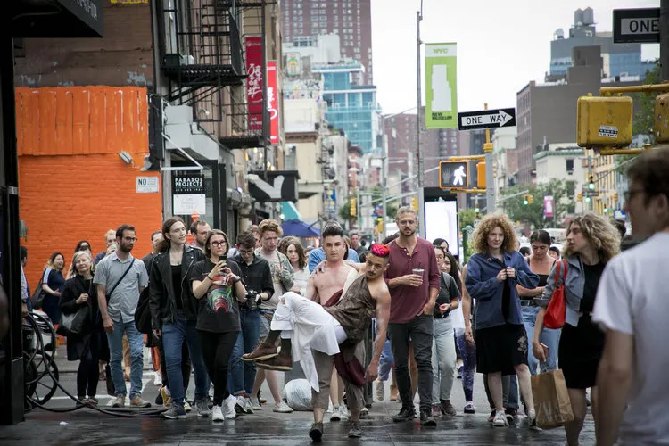 Crowd of people on city street