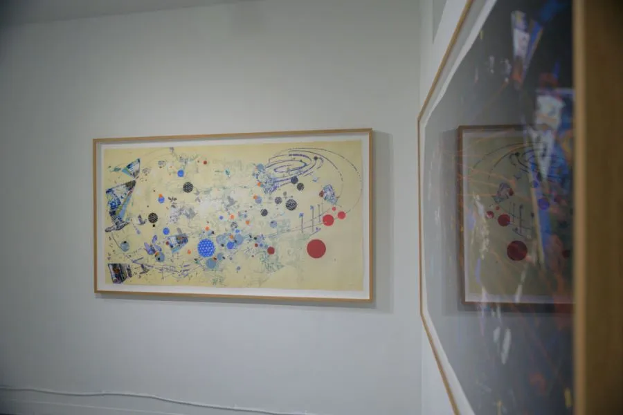 abstract art hanging on wall