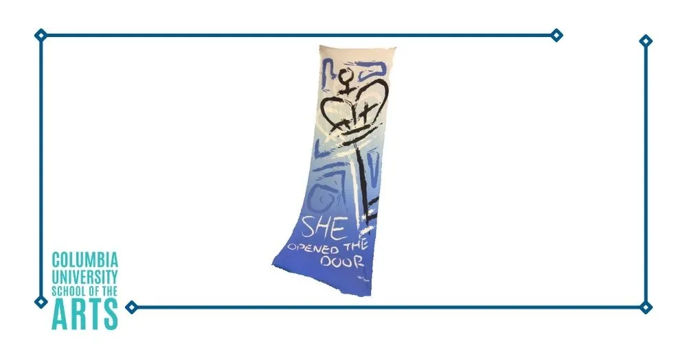 Blue and off-white scarf with design and text reading 'She opened the door'