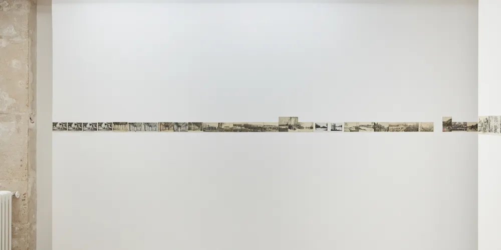 Sophie Kovel '22, 'Lieu de mémoire (À utiliser dans service intérieur),' (67 French colonial postcards (circa 1904–10); hung at the height of the surrounding fence at La Consulaire, Brest. 14 x 9 cm, 2017–ongoing.) © Studio Shapiro