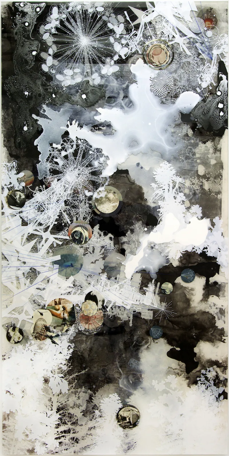Print with flowing, ink-like contrasting shapes in black, white, and cream; overlay of leaves and ferris wheel