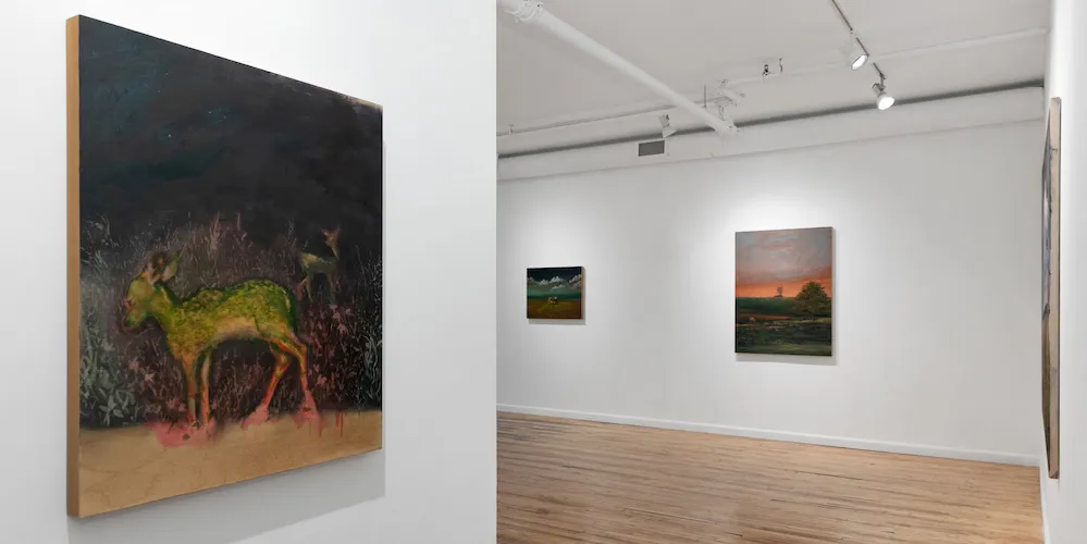 paintings on display in an art gallery
