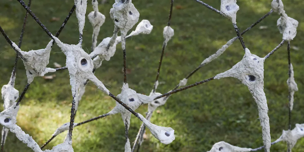 Linnéa Gad ’22, ‘Shoals II’ (metal covered by welding beads, lime mortar with crushed and whole "oyster eyes,” and Gofun Shirayuki a Japanese pearl white pigment made from decomposed oyster shells 2023). Courtesy of artist. Photo credit: David Schulze.