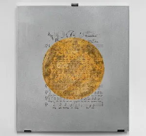 Gold circle on a square aluminum background. 