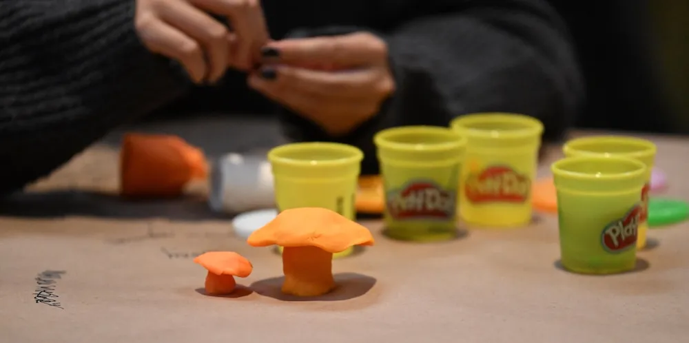 Containers of Play Doh. 