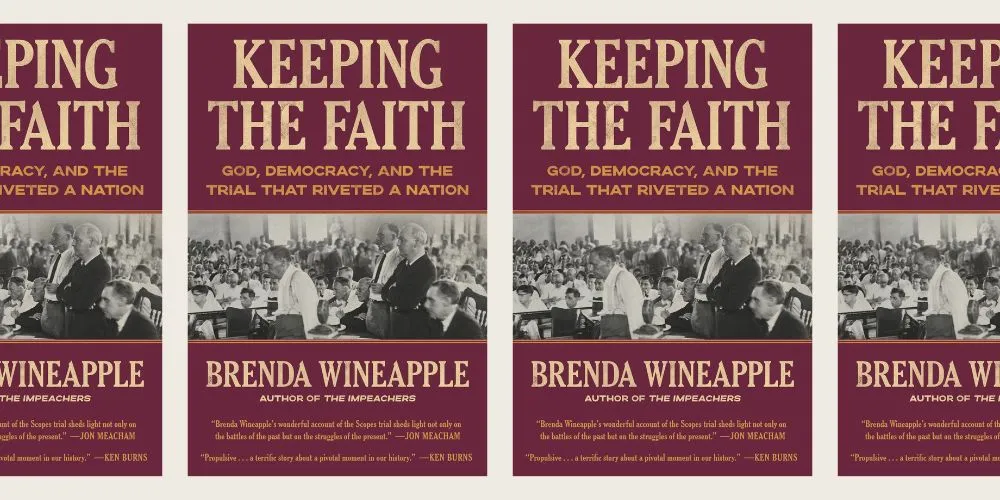 Several burgundy book covers with a black and white photograph of men in a courtroom. 
