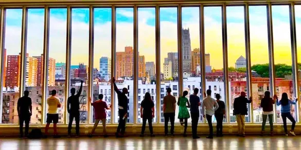 students in front of Lenfest windows