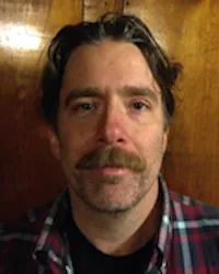 Headshot of Josh Carlebach