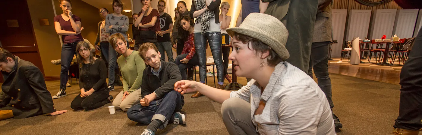 Students sitting on the floor