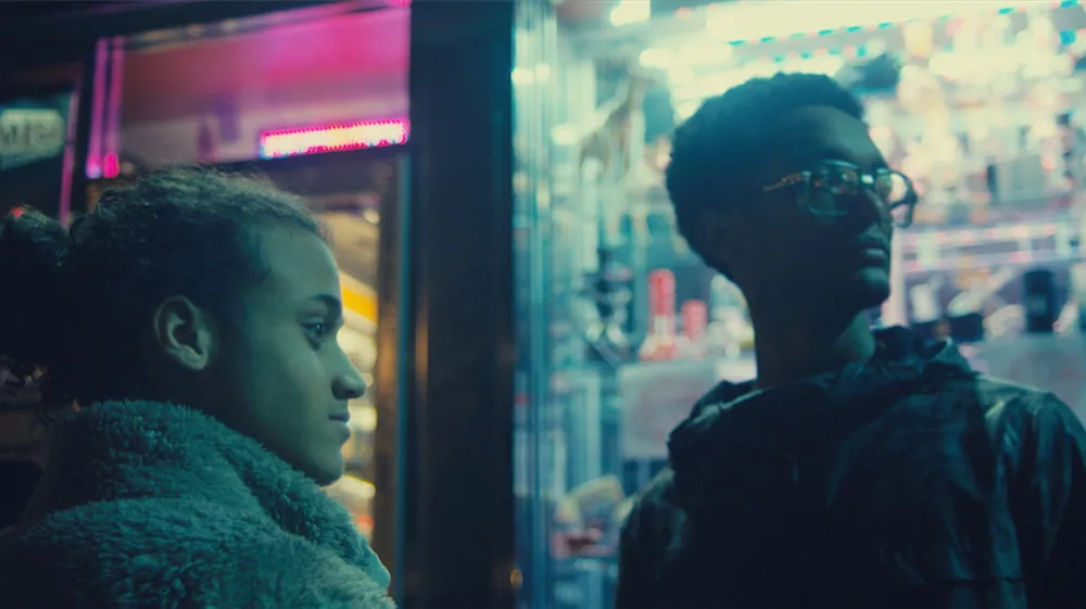 Two people standing outside