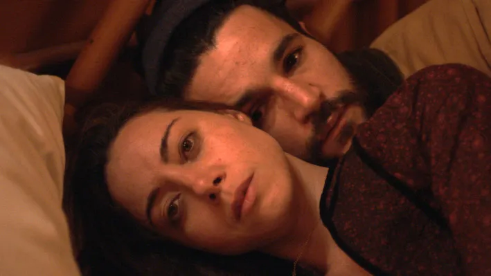 A couple in bed