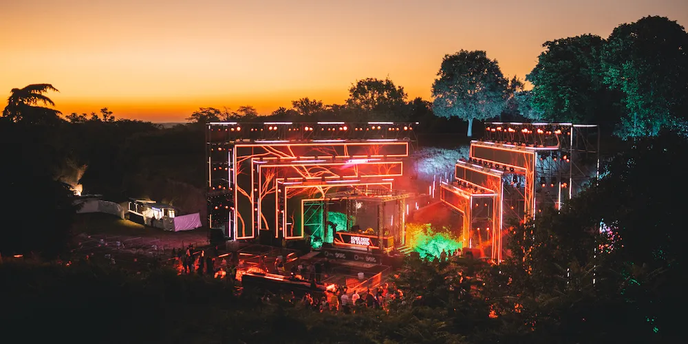 An outdoor stadium with lots of lights but in nature