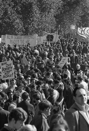 People in a crowd protesting. 